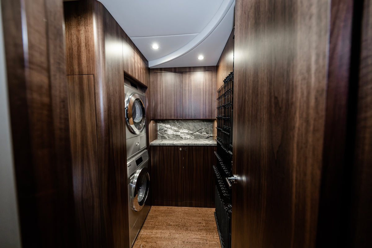 Luxury laundry room on this fishing yacht where the extra fishing rods are hanging using our medium claws.